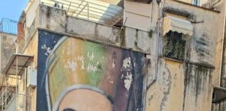 Jorit restaura il murale di San Gennaro restituendolo alla città di Napoli